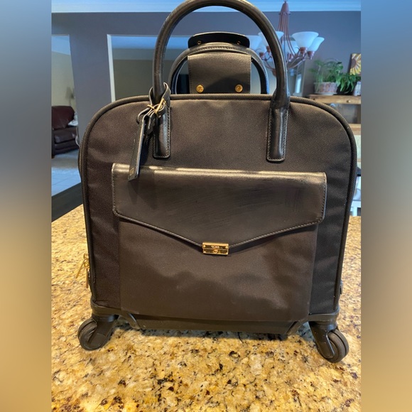 Tumi Handbags - TUMI laptop roller luggage bag